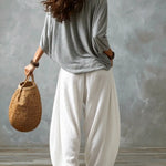 White Off-the-shoulder Top And Loose-fitting Lantern Pants Set