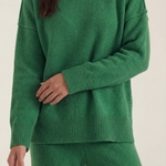 Turtleneck knit sweater and jeans set