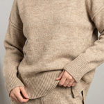 Turtleneck knit sweater and jeans set
