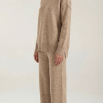 Turtleneck knit sweater and jeans set